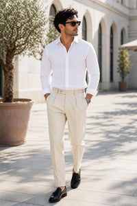 Traverse Tapered Pant in apricot, walking through a plaza